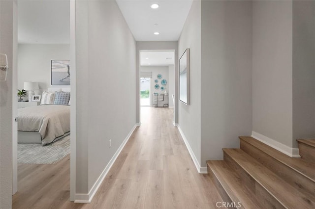 hallway featuring light hardwood / wood-style flooring