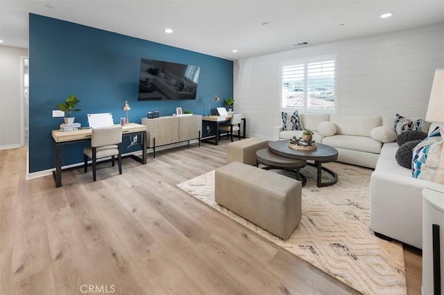 living room featuring light wood-type flooring