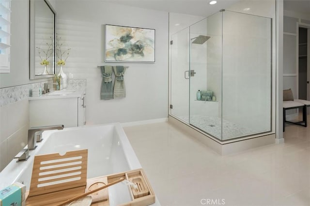 bathroom featuring vanity and walk in shower