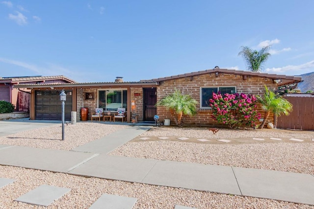 ranch-style home with a garage