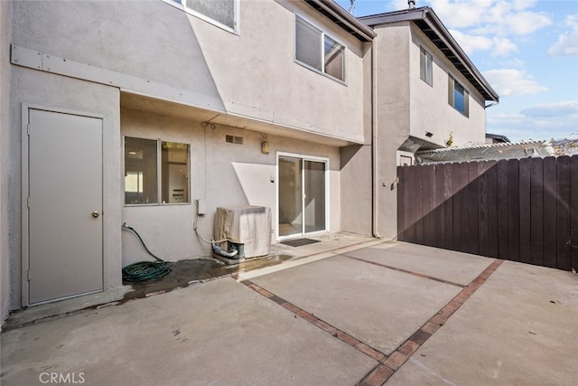 rear view of house with a patio