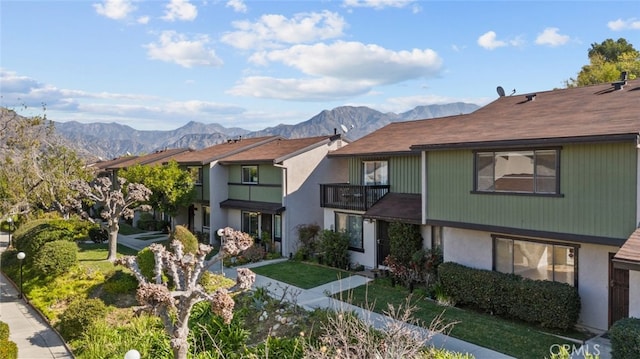 view of front of house with a mountain view