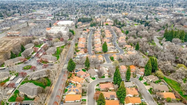 birds eye view of property with a residential view