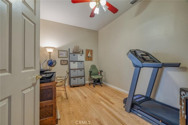 interior space with visible vents, baseboards, ceiling fan, and light wood finished floors