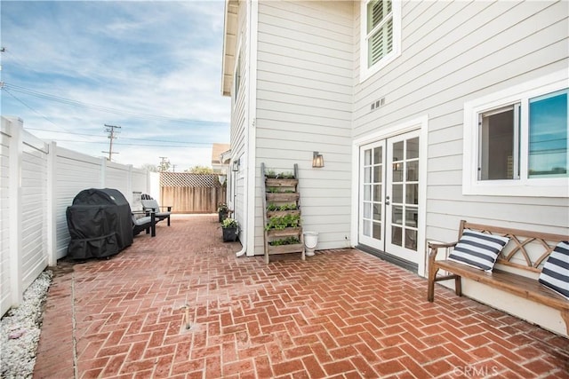 view of patio featuring grilling area and french doors