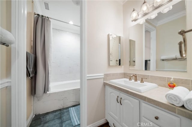 bathroom featuring ornamental molding, a combined bath / shower with marble appearance, vanity, and tasteful backsplash