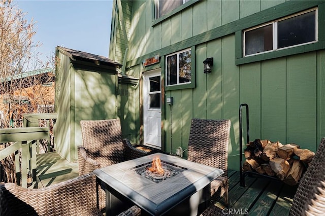 396 Kern Ave, Sugarloaf, CA 92386 - wooden deck with an outdoor fire pit