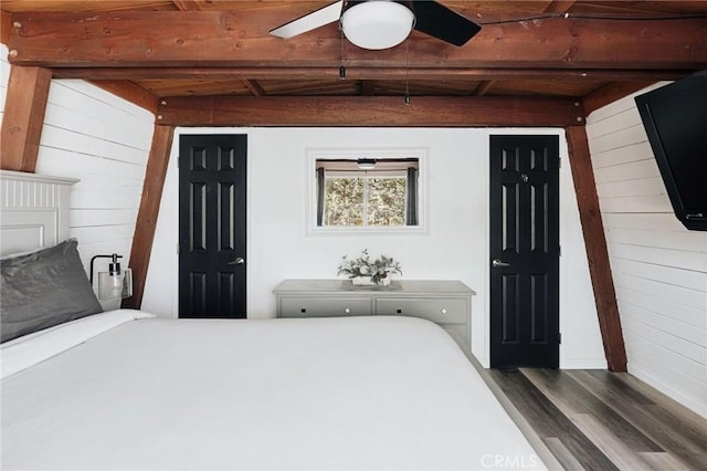 396 Kern Ave, Sugarloaf, CA 92386 - bedroom with dark wood-type flooring, beamed ceiling, wood walls, and wood ceiling