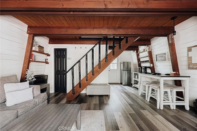396 Kern Ave, Sugarloaf, CA 92386 - unfurnished living room featuring dark wood-type flooring, beamed ceiling, wooden walls, and wood ceiling