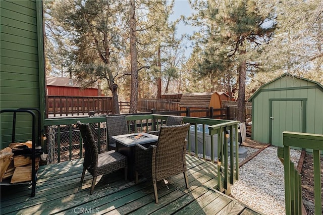 396 Kern Ave, Sugarloaf, CA 92386 - deck featuring a shed and a fire pit