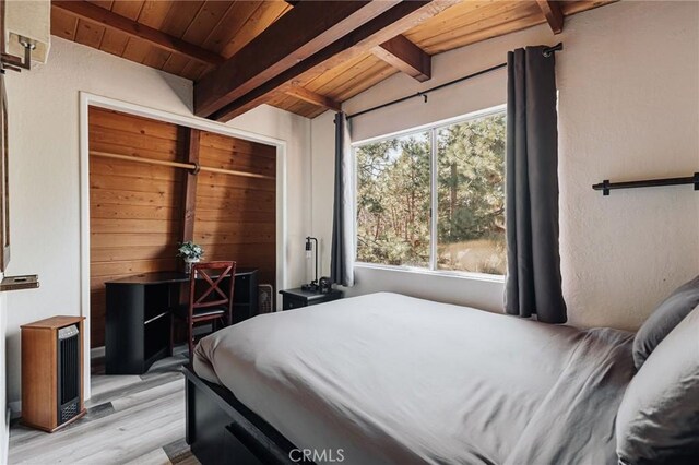396 Kern Ave, Sugarloaf, CA 92386 - bedroom featuring light hardwood / wood-style floors, a closet, vaulted ceiling with beams, and wooden ceiling