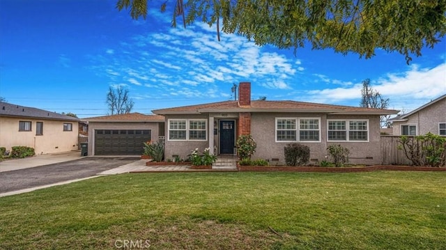 ranch-style home with driveway, a garage, a chimney, crawl space, and a front lawn