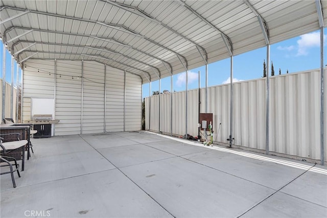 garage featuring a carport