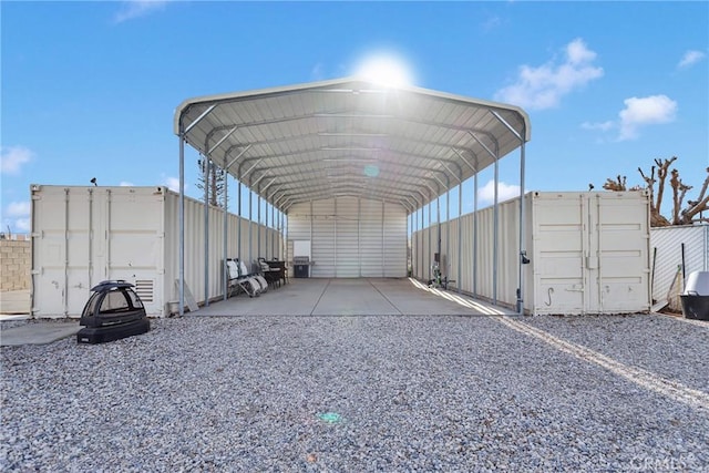 view of parking / parking lot with a carport