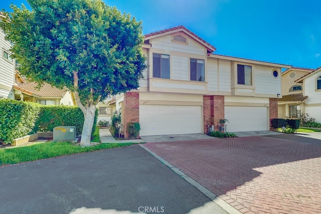 view of front of home with a garage