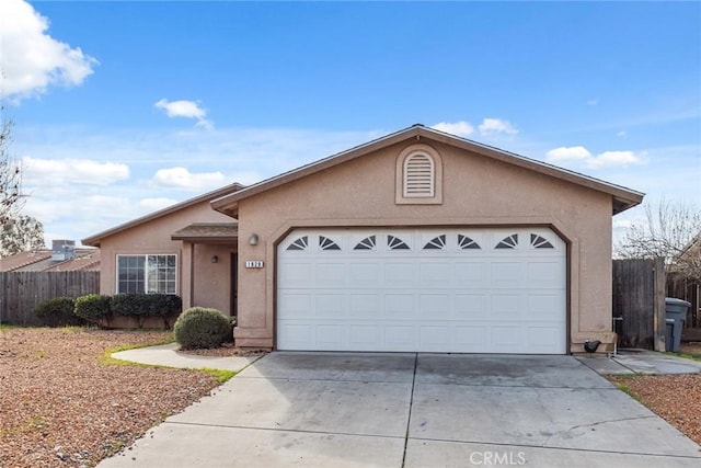 ranch-style house featuring a garage