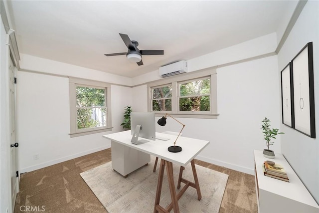 office space featuring ceiling fan, a wall unit AC, carpet flooring, and baseboards