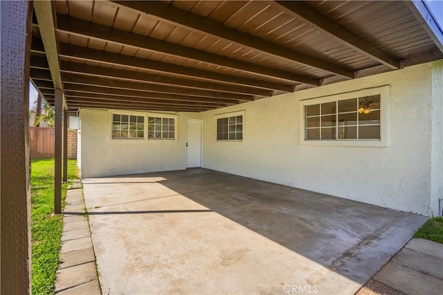 view of patio / terrace featuring fence