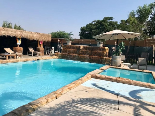 outdoor pool with a patio