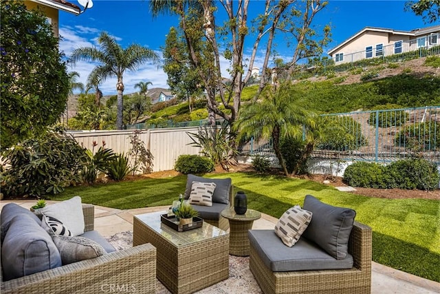 view of patio featuring a fenced backyard and an outdoor hangout area