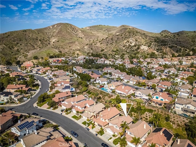 birds eye view of property featuring a residential view and a mountain view