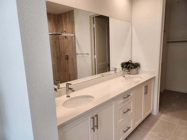 bathroom featuring vanity and tile patterned floors