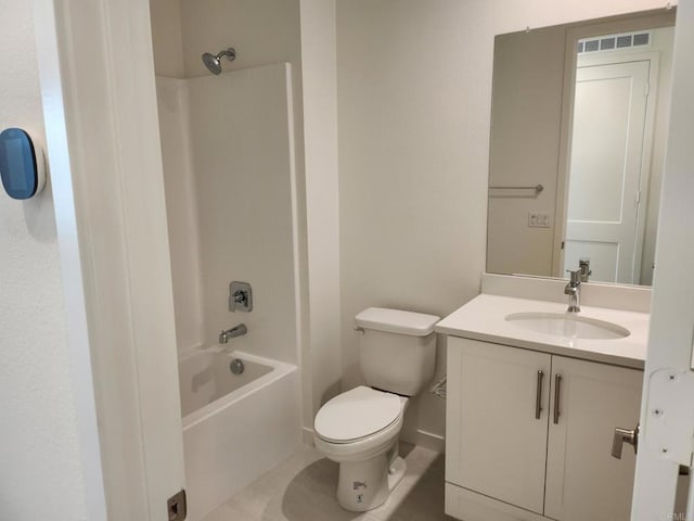 full bathroom with toilet, vanity, and washtub / shower combination