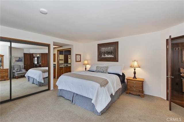 bedroom with light colored carpet