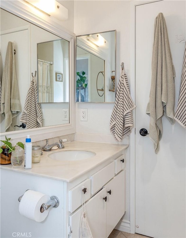 full bathroom featuring vanity