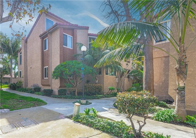 view of building exterior featuring driveway