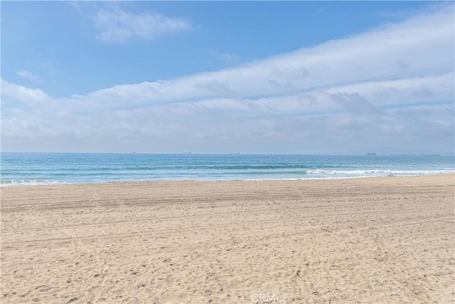 property view of water featuring a beach view