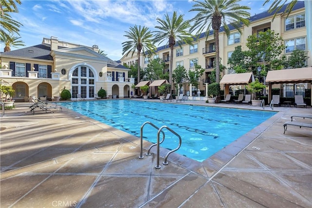 pool with a patio