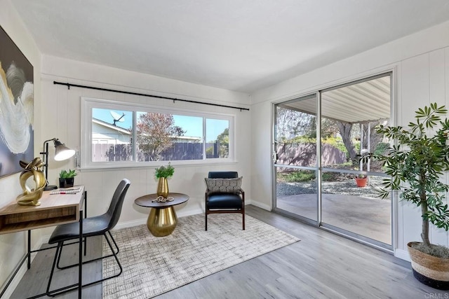 office with light hardwood / wood-style floors