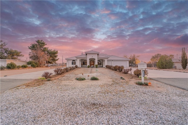 view of front of property with a garage