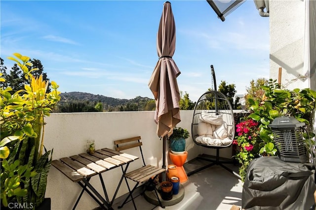 view of patio / terrace with a mountain view