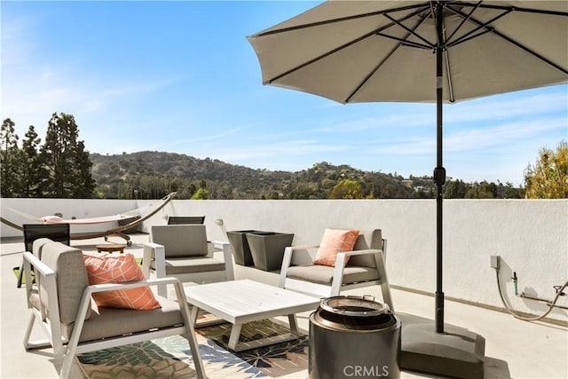 view of patio with a mountain view