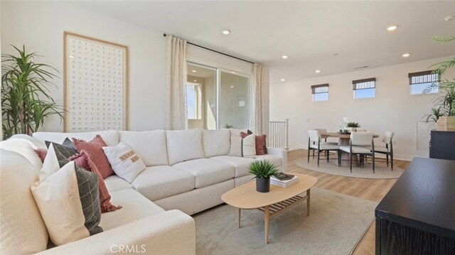 living room with light hardwood / wood-style floors