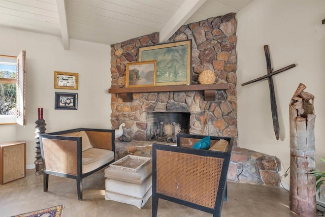 sitting room featuring wood ceiling, lofted ceiling with beams, and a fireplace