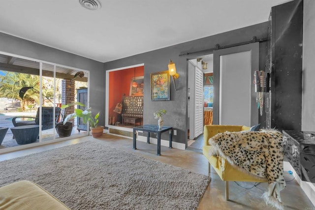 living area with a barn door