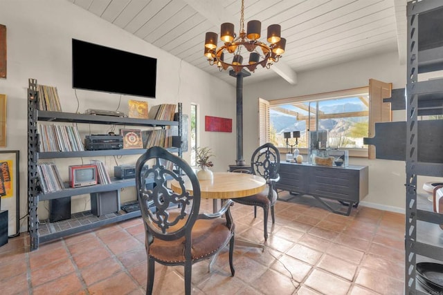 dining space with a notable chandelier, wood ceiling, tile patterned floors, and lofted ceiling