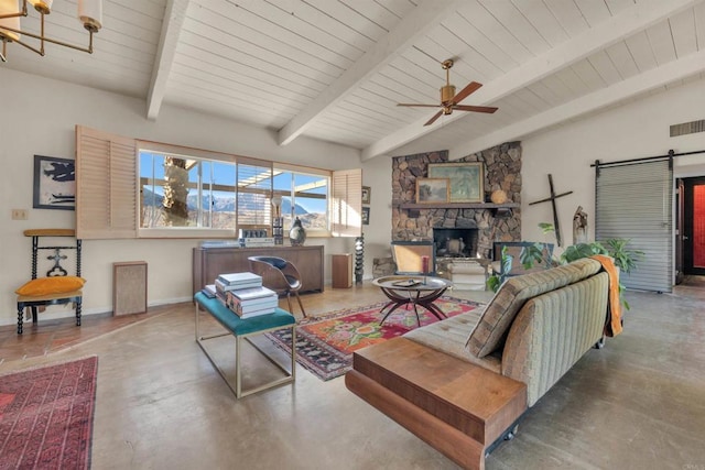 living room featuring a stone fireplace, ceiling fan with notable chandelier, lofted ceiling with beams, and concrete floors