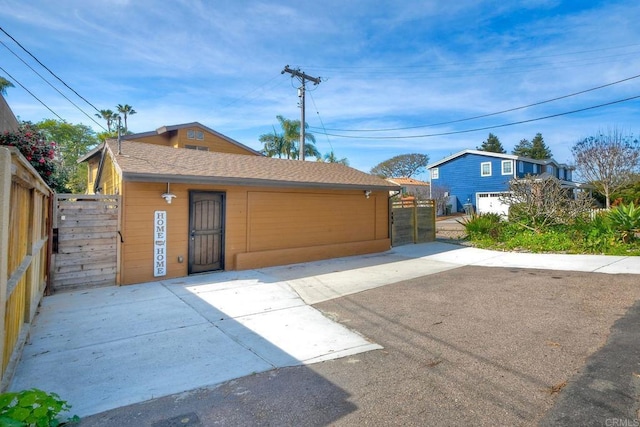 garage featuring fence