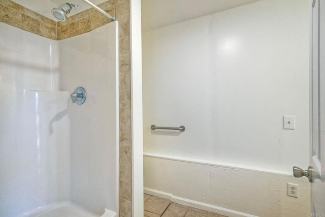 bathroom featuring tile patterned flooring and walk in shower