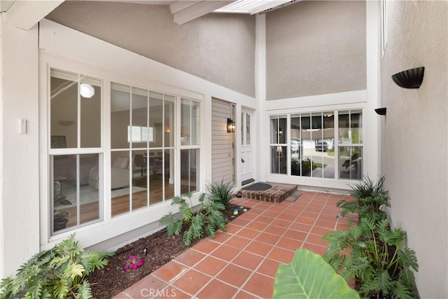 entrance to property featuring a patio area