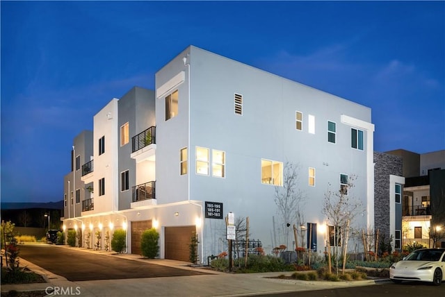 view of building exterior featuring a garage