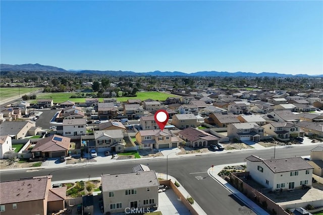 bird's eye view with a mountain view and a residential view