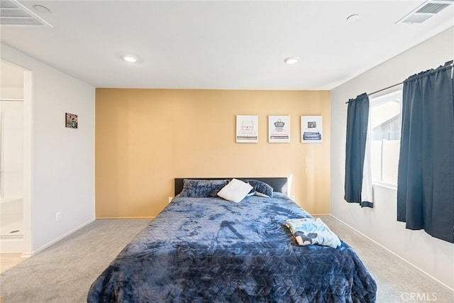 carpeted bedroom featuring visible vents, recessed lighting, and baseboards