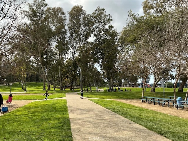 view of property's community with a yard