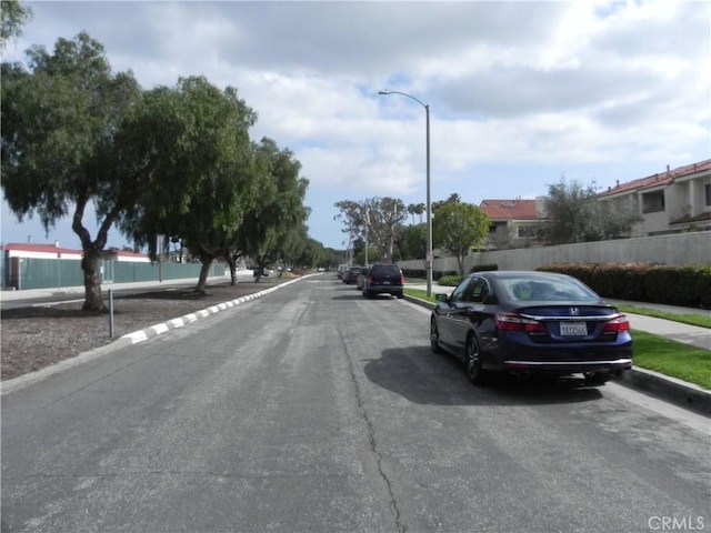 view of street with sidewalks and street lighting