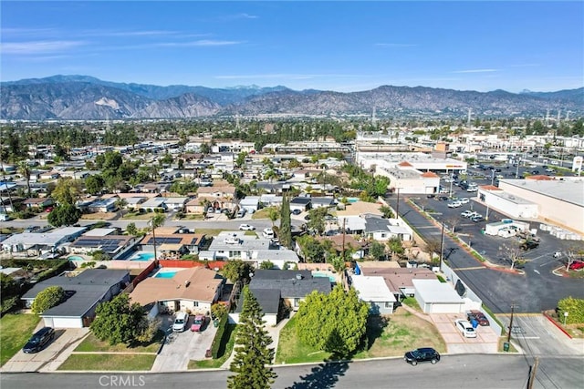 bird's eye view with a mountain view